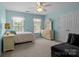 Serene bedroom with neutral tones, carpet, and lots of natural light at 9717 Waterton Ct, Huntersville, NC 28078