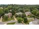 An aerial view of the neighborhood with tree-lined streets and well-maintained homes at 9717 Waterton Ct, Huntersville, NC 28078