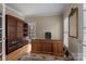 Office space featuring hardwood floors, lots of natural light and custom built in bookshelves at 9717 Waterton Ct, Huntersville, NC 28078