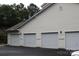 Attached garages offer ample parking and additional storage space at 9823 Hyde Glen Ct, Charlotte, NC 28262