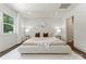 Well-lit main bedroom with hardwood floors, neutral decor, and ample space for furnishings at 1027 Dresden W Dr, Charlotte, NC 28205