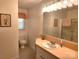 Bathroom featuring large vanity, toilet, and shower with glass door at 10414 Tillman Steen Rd, Indian Land, SC 29720