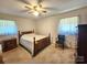Bedroom with carpet flooring, ceiling fan and natural light at 10414 Tillman Steen Rd, Indian Land, SC 29720