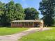 Charming brick ranch home with covered carport and paved driveway at 10414 Tillman Steen Rd, Indian Land, SC 29720
