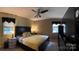 Cozy bedroom with a large bed, dresser, and natural light from the window at 106 Condover Pl, Charlotte, NC 28270