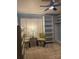 Bedroom with plantation shutters, walk in closet, dresser and accent chairs at 106 Condover Pl, Charlotte, NC 28270