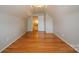 Spacious attic bedroom with hardwood floors and neutral colors at 11021 Travis Gulch Dr, Charlotte, NC 28277