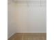 Spacious walk-in closet featuring neutral carpet and wire shelving for plenty of storage at 11021 Travis Gulch Dr, Charlotte, NC 28277