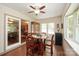 Inviting dining area with wood table, and natural light at 116 April Ln, Dallas, NC 28034