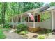 Charming front porch with patriotic decor, providing a welcoming entry to the home at 116 April Ln, Dallas, NC 28034