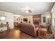 Spacious living room with hardwood floors, fireplace, and comfortable seating at 116 April Ln, Dallas, NC 28034