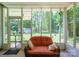 Inviting screened porch with comfortable seating and a view of the expansive backyard at 116 April Ln, Dallas, NC 28034
