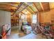 Shed interior with shelving, storage crates, and bicycles, showcasing a flexible and functional storage space at 116 April Ln, Dallas, NC 28034