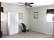 Bedroom features neutral tones, a ceiling fan, and built in cabinet, offering a clean and comfortable space at 116 Woodbark Ln, Kings Mountain, NC 28086