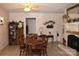Dining room with traditional furniture, fireplace and shelves at 116 Woodbark Ln, Kings Mountain, NC 28086