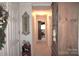 Hallway with decorative wall art and carpet at 116 Woodbark Ln, Kings Mountain, NC 28086