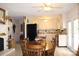 Eat in Kitchen with white cabinets, granite counters, stainless appliances and a large dining table at 116 Woodbark Ln, Kings Mountain, NC 28086