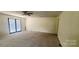 Open-plan living room with ceiling fan and sliding glass doors to the outside at 116 Woodbark Ln, Kings Mountain, NC 28086