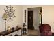 Cozy living room with decorative wall art, a vintage cabinet, and a comfortable armchair at 116 Woodbark Ln, Kings Mountain, NC 28086