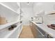 Walk-in pantry with custom shelving and countertop space at 1321 Ferncliff Rd, Charlotte, NC 28211