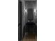 Contemporary powder room featuring a sleek black sink, modern fixtures, and stylish lighting sconces at 1356 Briar Creek Rd, Charlotte, NC 28205
