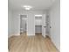 Spacious bedroom with wood flooring and ensuite bathroom at 1356 Briar Creek Rd, Charlotte, NC 28205