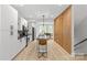 Contemporary kitchen with a central island and open layout to the dining area at 1356 Briar Creek Rd, Charlotte, NC 28205