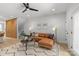 Open living area with ceiling fan, stylish furnishings, and neutral color palette at 1356 Briar Creek Rd, Charlotte, NC 28205