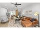 Open-concept living room with modern decor and lots of natural light at 1356 Briar Creek Rd, Charlotte, NC 28205