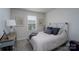 Comfortable bedroom featuring decorative prints, a window, and furnishings at 154 Stella Ln # A, Troutman, NC 28166