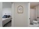Bright hallway showcasing access to a bedroom and bathroom with neutral decor at 154 Stella Ln # A, Troutman, NC 28166