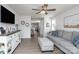 Bright living room featuring an entertainment console, comfortable seating, and wood floors at 154 Stella Ln # A, Troutman, NC 28166