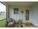 Bright sunroom with white siding and a welcoming entrance at 154 Stella Ln # A, Troutman, NC 28166