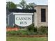 Welcoming sign for Cannon Run community set amidst landscaped greenery, showcasing the neighborhood's identity at 1598 Respect St, Concord, NC 28027