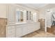Elegant bathroom with dual vanities, ample storage, and stone accents, creating a spa-like retreat at 1728 Shadow Forest Dr, Matthews, NC 28105