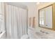 Clean bathroom with a shower, large vanity, and neutral tones creating a soothing ambiance at 1728 Shadow Forest Dr, Matthews, NC 28105