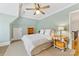 Attic bedroom featuring a light blue walls, and neutral colored carpet and furniture at 1728 Shadow Forest Dr, Matthews, NC 28105