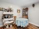 Cute eat-in kitchen area with vintage decor, wood floors, and plenty of counter space at 206 Charlotte St, York, SC 29745