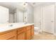 Bathroom features double sink vanity, toilet and shower with tile surround at 237 Lylic Woods Dr, Fort Mill, SC 29715