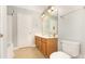 Bathroom with a double sink vanity, toilet and full mirror on wall at 237 Lylic Woods Dr, Fort Mill, SC 29715