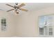 Bright bedroom with ceiling fan and two windows at 237 Lylic Woods Dr, Fort Mill, SC 29715