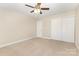 Spacious bedroom includes a ceiling fan and closet for ample storage at 237 Lylic Woods Dr, Fort Mill, SC 29715
