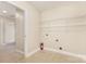 Laundry room with tile flooring, wire shelving, and washer/dryer hookups at 237 Lylic Woods Dr, Fort Mill, SC 29715