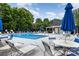 Community pool with chairs and tables at 237 Lylic Woods Dr, Fort Mill, SC 29715