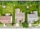 Aerial view showcasing the home's layout, landscaping, and neighborhood in a serene, green environment at 3008 Cornflower Ln, Indian Trail, NC 28079