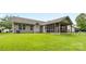 Spacious backyard with a screened-in porch, perfect for outdoor living at 3008 Cornflower Ln, Indian Trail, NC 28079