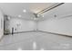View of the clean and spacious two-car garage with an automatic door opener and lots of space at 3008 Cornflower Ln, Indian Trail, NC 28079