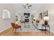 Cozy living room features a fireplace, stylish decor, and hardwood floors at 3008 Cornflower Ln, Indian Trail, NC 28079