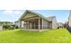 View of the spacious screened porch, a perfect place for outdoor relaxation and entertainment at 3008 Cornflower Ln, Indian Trail, NC 28079