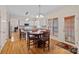 This expansive kitchen features white cabinetry, modern appliances, and a breakfast nook at 3830 Waters Reach Ln, Indian Trail, NC 28079